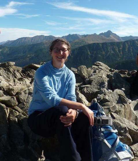 Kate at the top of a mountain near Zakopane, taking a break from her proofreading and copy-editing services