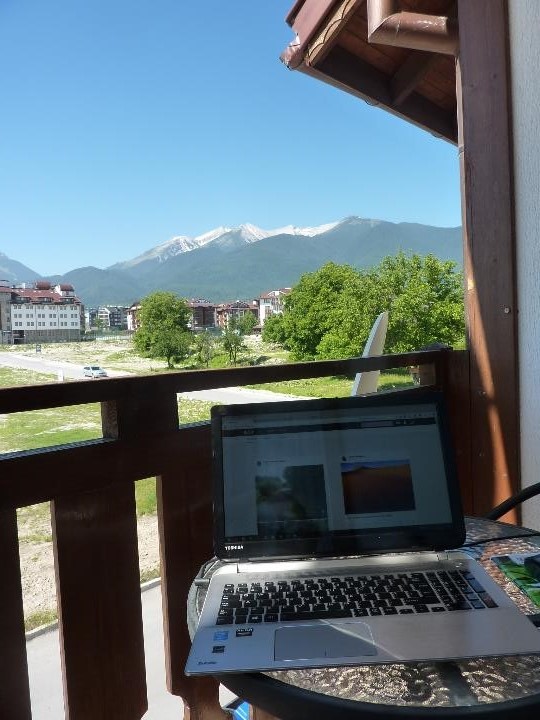 Office with a view: proofreading with the backdrop of Bulgarian mountains